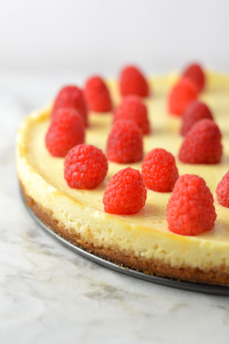 Healthy Greek Yogurt Raspberry Cheesecake recipe. Less calories and fat than your typical cheesecake, and tastes virtually the same!