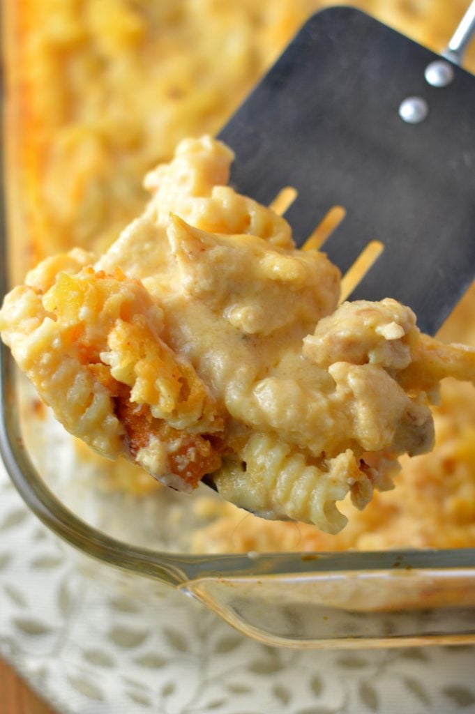 Creamy Baked Cheesy Chicken Pasta that is so easy to make. Made with two types of cheeses, this is the ultimate comfort food casserole for dinner. 