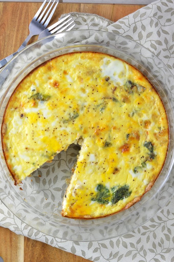 This Spinach and Feta Quiche is made with fresh baby spinach, crumbled feta and homemade crust. One of my favourite dinner recipes.