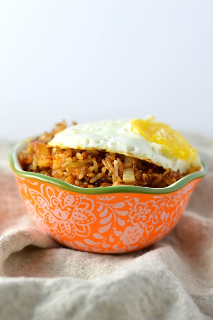 This Kimchi Fried Rice is so easy to make, and is a great way to use up your day old rice. Topped with a fried egg so that you can have some egg yolk sauce!