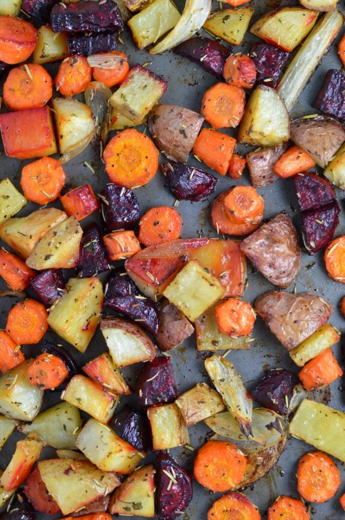 This Roasted Potatoes, Carrots and Beets recipe is the perfect way to roast your root vegetables. Seasoned with balsamic vinegar and rosemary.
