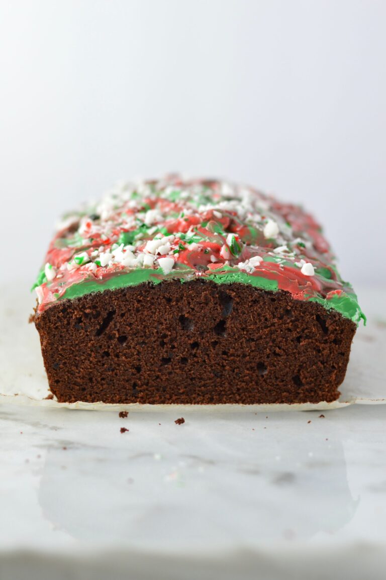 Peppermint Bark Chocolate Bread recipe is basically a cake with melted chocolate and crushed candy canes on top. The perfect dessert for Christmas.