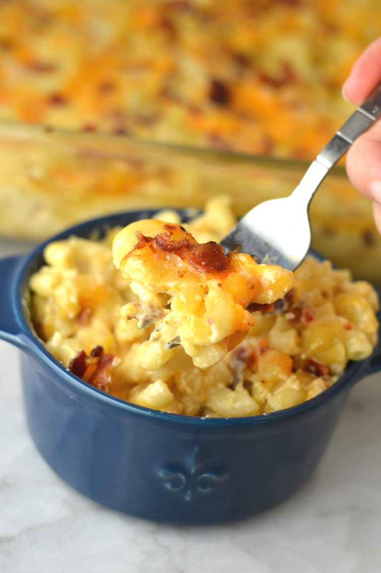 Creamy Baked Bacon Macaroni and Cheese that is so easy to make. My favourite weeknight dinner recipe idea made with cheddar and mozzarella.