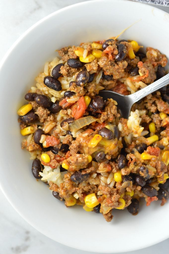  Easy Taco Rice Casserole Freezer Meal made with beans and ground beef. Great recipe to make ahead for the week as your weekly dinner meal prep.