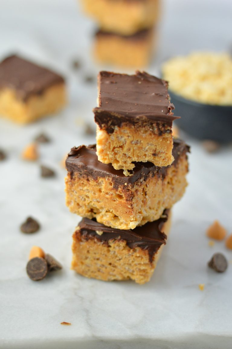 Easy Butterscotch, Peanut Butter and Chocolate Rice Krispie Squares recipe makes for a quick and easy treat. Made without marshmallows.