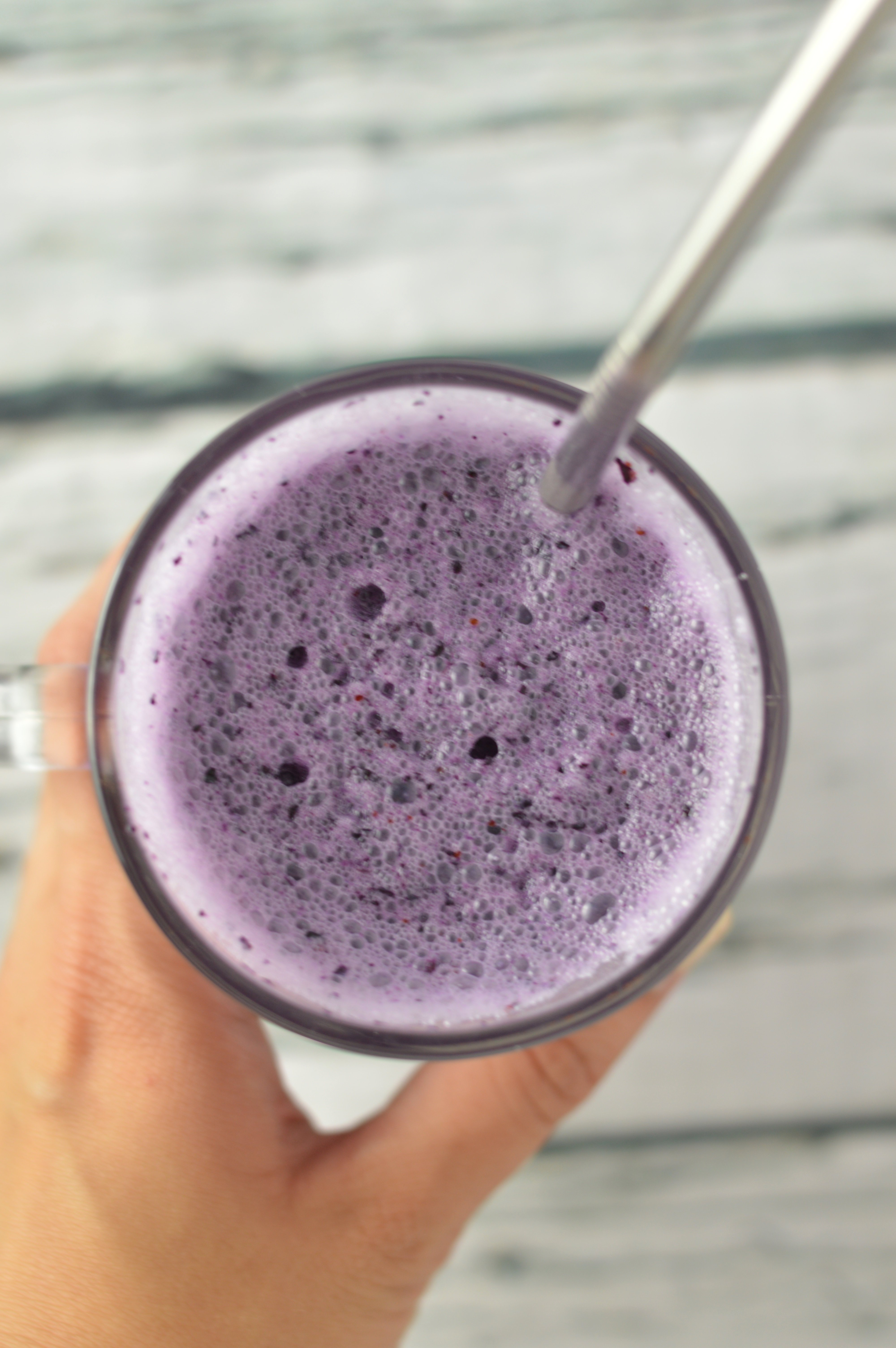 3 ingredient Blueberry Milkshake made with vanilla ice cream. This drink is so refreshing and such an easy recipe to make!