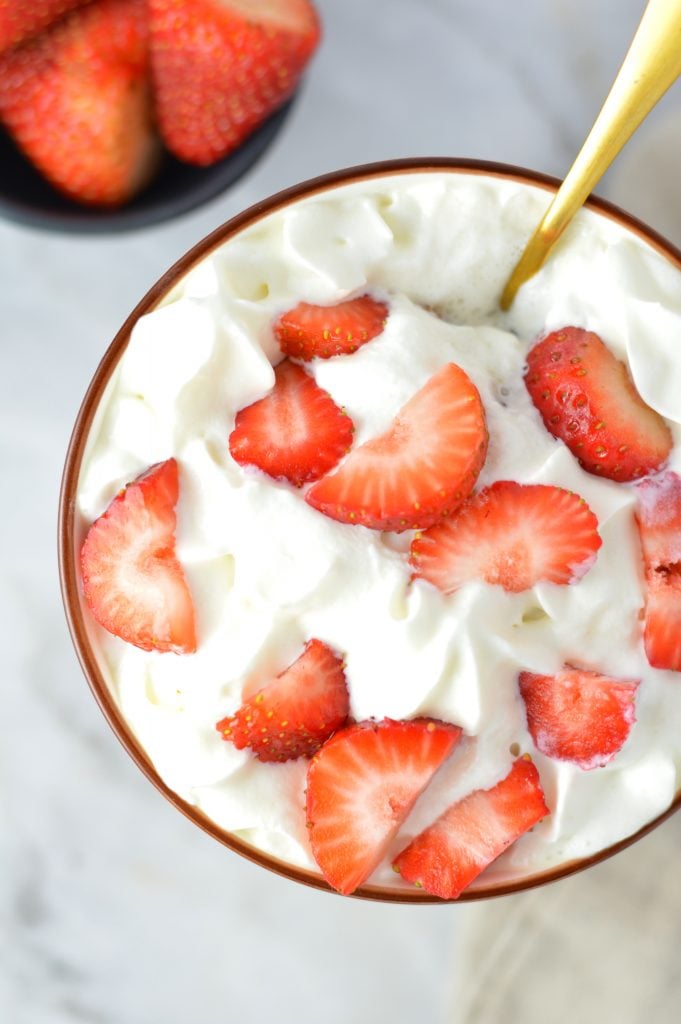 Easy Strawberry Shortcake Oatmeal recipe. This decadent breakfast idea is so good, you could even eat it for dessert! Whipped cream optional.