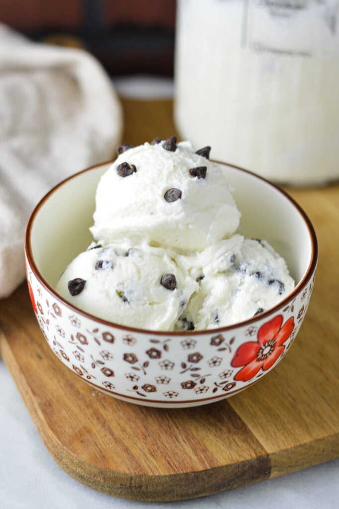 A bowl of homemade Ninja Creami Chocolate Chip Ice Cream in a small bowl.