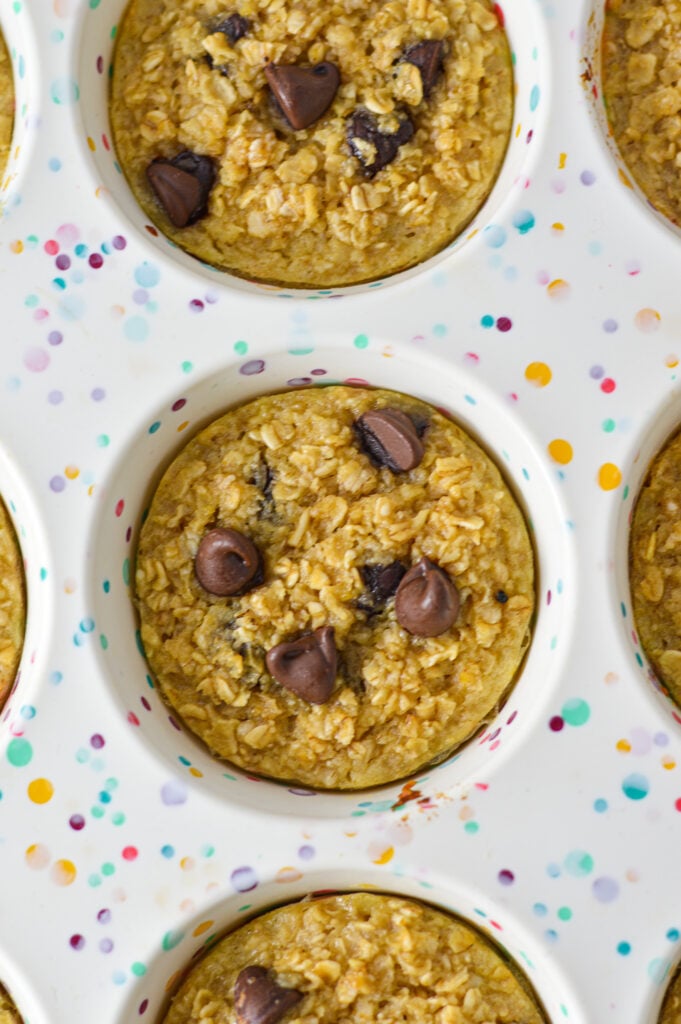 Freshly baked Chocolate Chip Baked Oatmeal Cups in a silicone muffin pan.