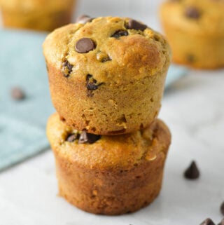 A stack of Healthy Peanut Butter Chocolate Chip Oat Muffins without any paper liners.
