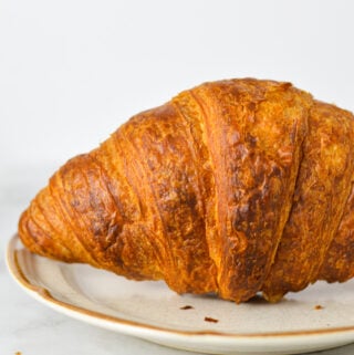 A closeup of a golden brown Air Fryer Croissant, made using Costco's croissants.